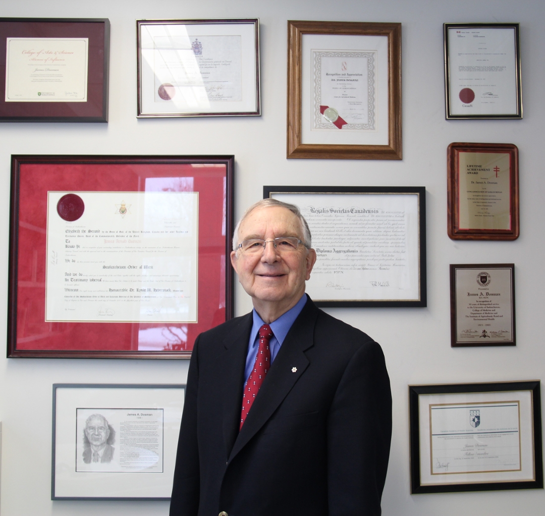 Dr. James Dosman’s (MD) office is lined with awards and accolades from his remarkable career. (Photo: Kristen McEwen)